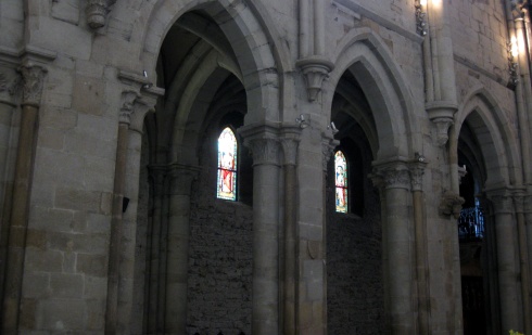 Arches along the interior wall of the abbey